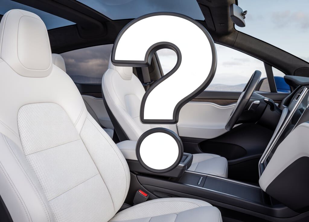 Interior of a Tesla Model X with white leather seats and a large question mark overlay, highlighting the question: Do Tesla Model X seat covers affect airbags or ventilation?