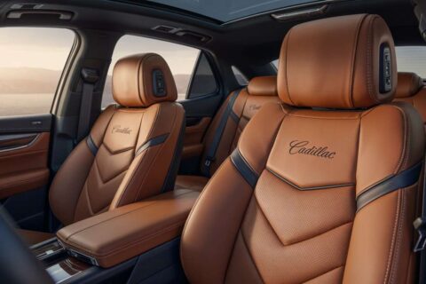 Premium Cadillac seat covers in brown leather design, showcasing stylish comfort and elegant car interior.