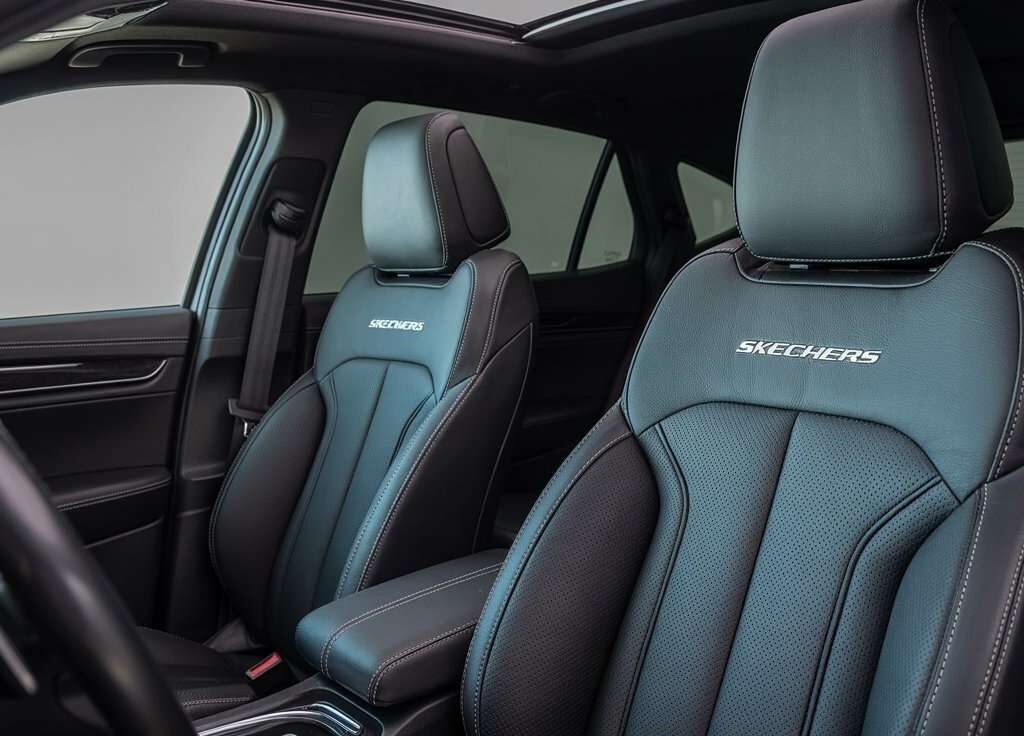 Premium black leather interior featuring top Skechers car seat covers designed for ultimate comfort and modern car aesthetics.