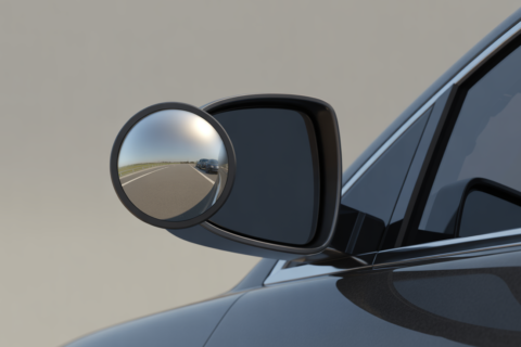 Best blind spot mirror for cars installed on a side mirror showing wide angle rear traffic clearly