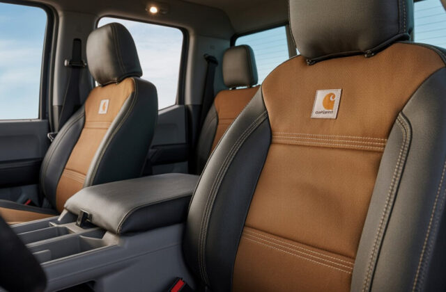 Durable Carhartt seat covers installed on front truck seats with brown duck-weave fabric and reinforced stitching.